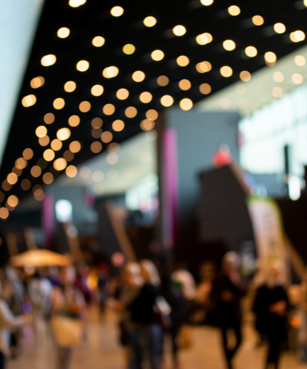 blurred-crowd-of-people-in-modern-interior-during-2023-11-27-04-56-18-utc-scaled.jpg